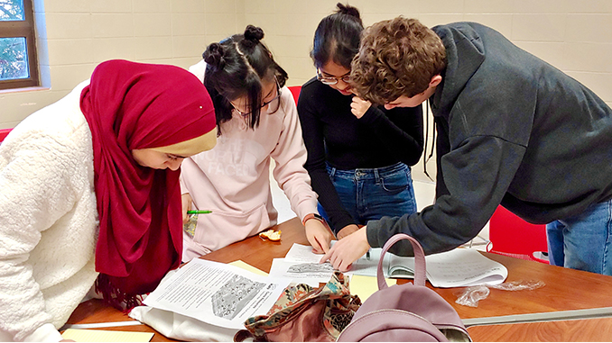 [Photo of Students Around the Table] ASMS Students Succeed in National Mathematics Puzzle Competition 