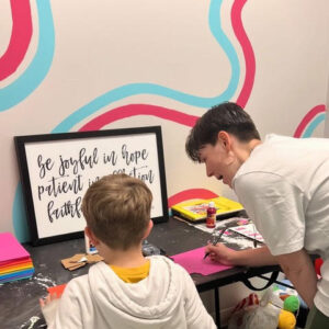 boy learning art