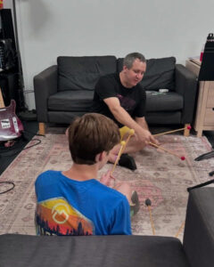boy learning drums