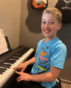boy at piano